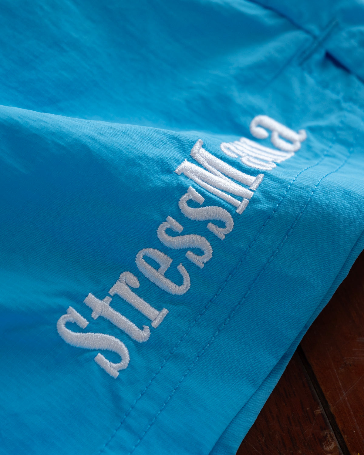 STRESSMAMA FLOATING TRACK SHORTS - BLUE
