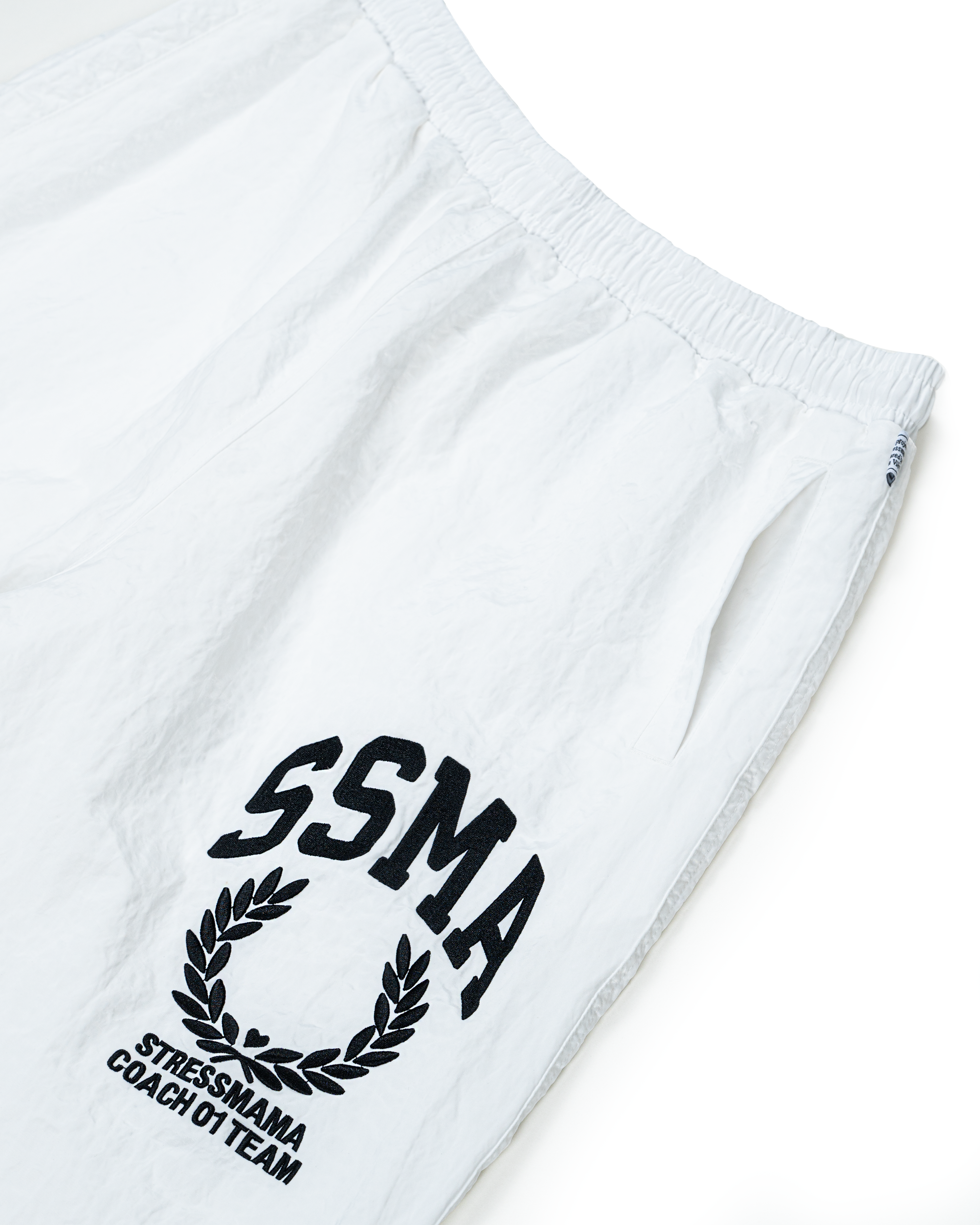 FW25 SSMA TRACK PANTS - WHITE