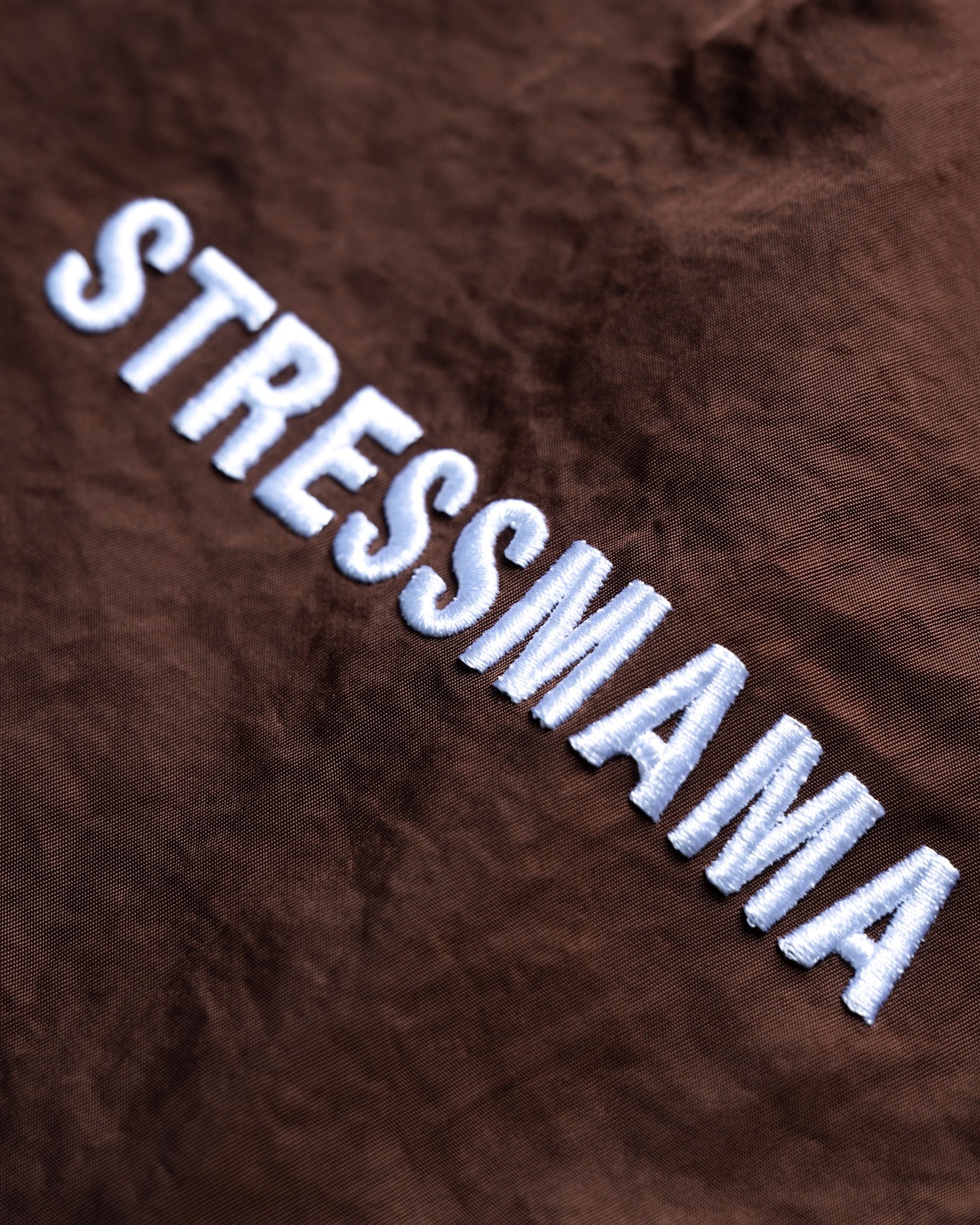 SSMA COACH TRACKSUIT PANTS - BROWN